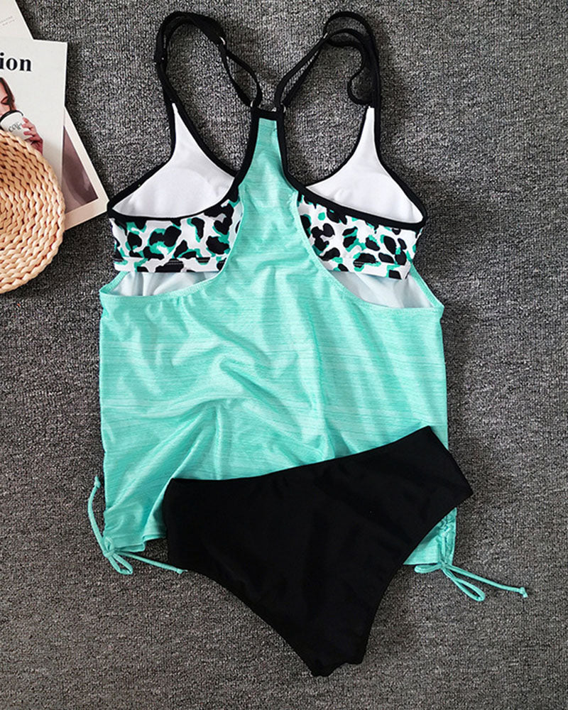 Augustus - Tankini de un solo color con estampado de leopardo