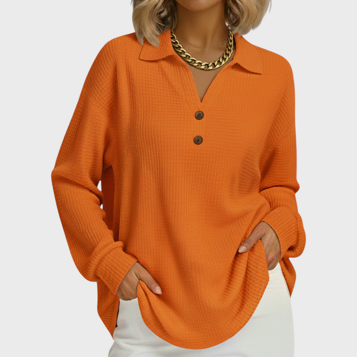 Laura - Suéter naranja con cuello tipo polo