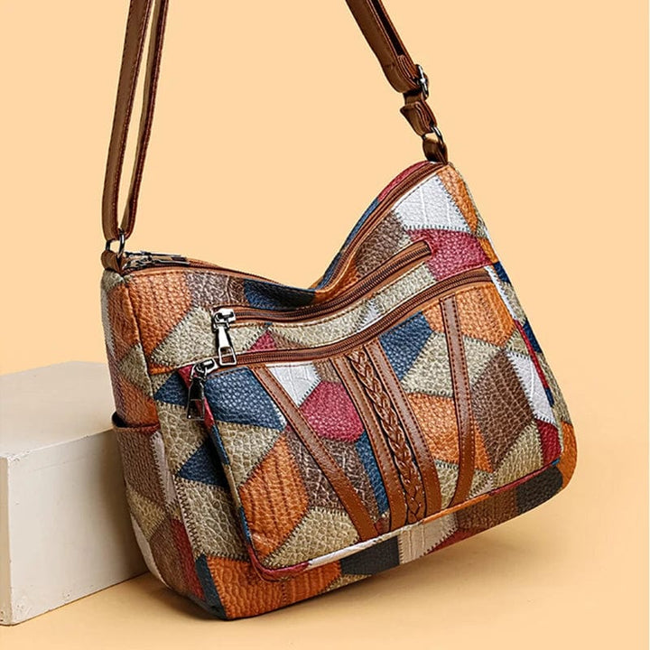 Solara - Bolso de mano de cuero mosaico